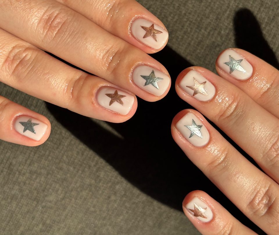 Metallic star details on a short squoval Shellac manicure by Mary